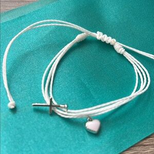 25 individually packaged White String Bracelet with Heart and Cross Charms
